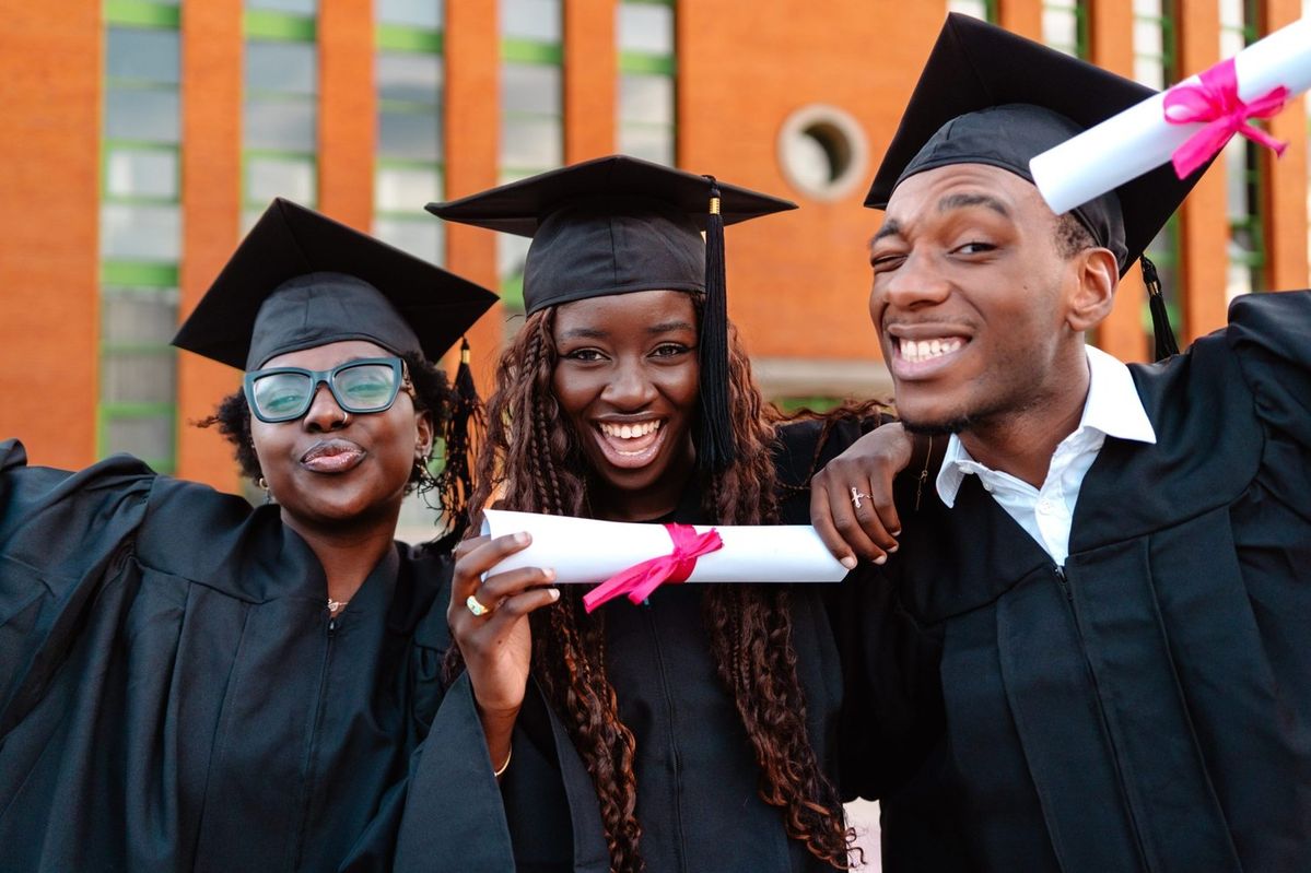 Young African graduates celebrating a milestone